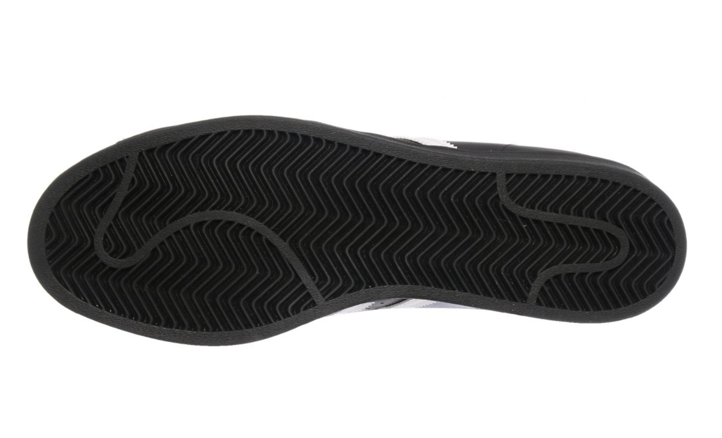 Tenis Adidas Superstar Negro con franjas blancas vista lateral