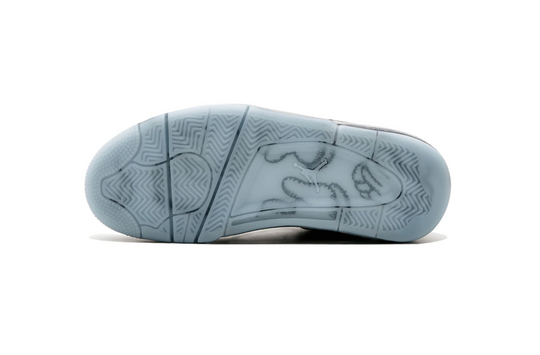 Jordan 4 Kaws color gris edición limitada con suela luminosa México