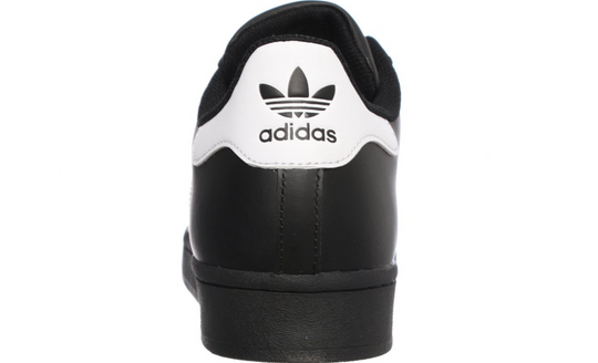 Tenis Adidas Superstar Negro con franjas blancas vista lateral