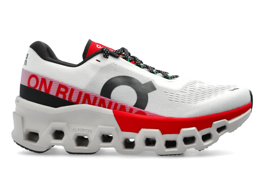 On Cloudmonster 2 Blanco Rojo vista lateral.
