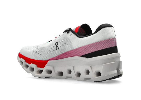 On Cloudmonster 2 Blanco Rojo vista lateral.