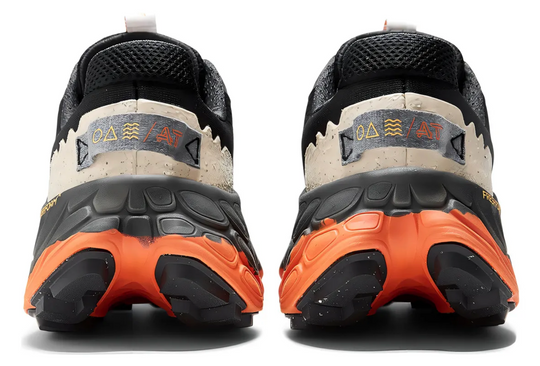 Tenis New Balance Fresh Foam Negro Naranja México vista lateral.