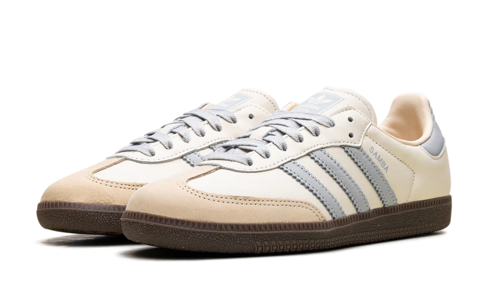 Adidas Samba Azul con diseño clásico, franjas celestes y suela de goma café, estilo retro urbano