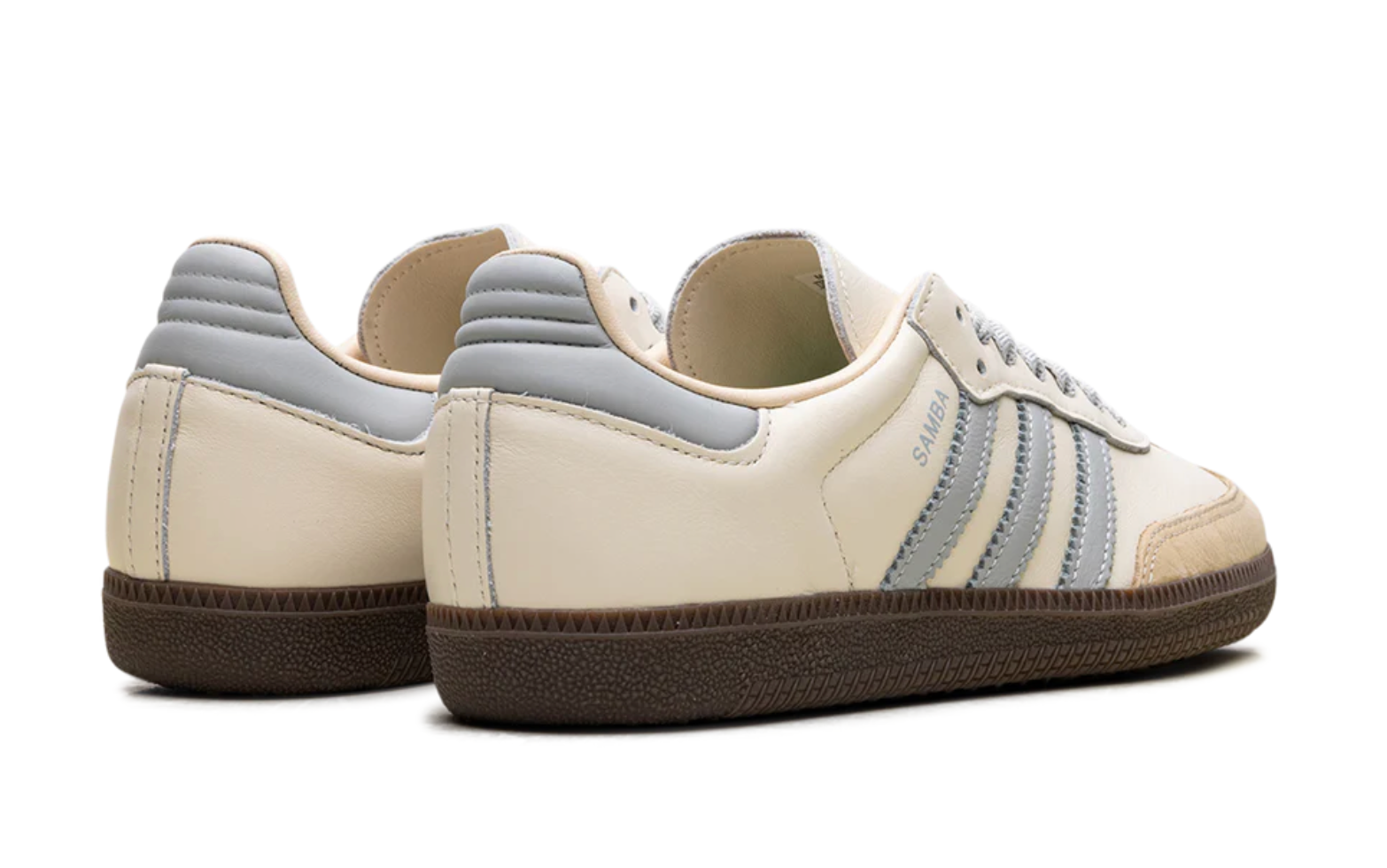Adidas Samba Azul con diseño clásico, franjas celestes y suela de goma café, estilo retro urbano