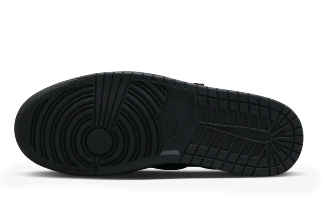 Jordan 1 Low Travis Scott Phantom en color negro con Swoosh invertido y costuras blancas