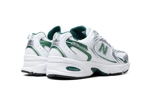 Tenis New Balance 530 Blanco con Verde Mujer México vista lateral.
